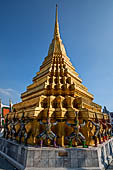 Bangkok Grand Palace, the Wat Phra Keow (temple of the Emerald Buddha), gilded chedi on the east end of the raised platform. 